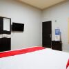 Отель RedDoorz near Mutiara SIS Al Jufrie Airport Palu, фото 10