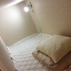 Отель Toranomon Station bnbplus Capsule hotel, фото 15