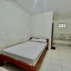 Отель OYO Life 93504 Kost Krisna, фото 10