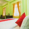 Отель OYO 1419 Rhona Guest House Syariah, фото 14