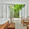 Отель Tropical Apt. in Beach Club Resort with Private Spa Bath, фото 9