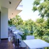 Отель Sanders Rio Gardens - Treasured Studio With Shared Pool and Balcony, фото 9
