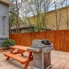 Отель Vibrant, Colorful Condo Building With Backyard Firepit and Games, фото 11