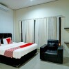 Отель OYO 90979 Ryfana Residence Syariah, фото 23