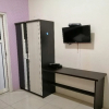 Отель Wisma Lusya near GOR Satria RedPartner, фото 2