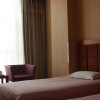Отель Meiyijia Business Hotel в Синьсян