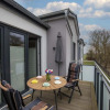 Отель Exclusives Appartement auf Fehmarn, фото 3