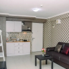 Отель Spacious and Comfortable 2BR at Bassura City Apartment near Mall, фото 1