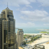Отель KOHH – 1BR in Cayan Tower, фото 1