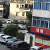 Отель Xin Cai Zi Business Hotel, фото 1