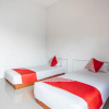 Отель OYO 93476 Owo Guest House Syariah, фото 15