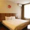 Отель Eaka 365 Hotel Cangzhou Huanghelou Branch, фото 1