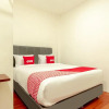Отель Capital O Tmj Guest House Near RSUD Pringadi, фото 4