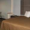 Отель Woodland Inn and Suites, фото 2