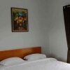 Отель Villa Fahim 2 Puncak 4 Bedroom, фото 3