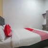 Отель OYO 945 Mega Kost 2, фото 7