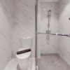 Отель Nice And Homey 1Br At Branz Bsd City Apartment, фото 7