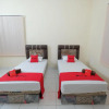 Отель Reddoorz Plus Syariah Near Pasar Sekumpul Martapura, фото 10