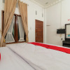 Отель RedDoorz Syariah near Universitas Putra Indonesia Padang, фото 11