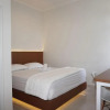 Отель OYO 90023 Damar Kusumo Guest House, фото 3