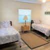 Отель Beach Daze Townhome at Sea Dunes Green Turtle B5 Ocean View Next to Pool, фото 6