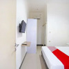 Отель OYO 91508 Ruby Homestay Syariah, фото 7