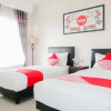 Отель Oyo 696 Hasanah Guest House Syariah de Saphire, фото 6