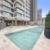Отель Modern 1BR With Swimming Pool and gym in JVC, фото 1