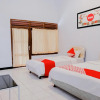 Отель OYO 421 Alianda Guest House Syariah, фото 4