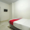 Отель OYO 90907 Handika Jaya Bs, фото 6