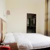 Отель Yuanlong Business Hotel, фото 4
