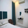 Отель OYO 93311 Pesona Orange Homestay, фото 3