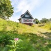 Отель Beautiful Dune Villa With Thatched Roof On Ameland 800 Meters From The Beach, фото 1