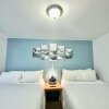 Отель Bluebird Day Inn & Suites, фото 20