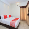Отель OYO 13915 Albis Ville, фото 18