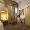 Отель The Charm Suites, фото 1