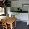 Отель Nice bungalow with dishwasher, close to the forest, фото 4