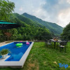 Отель Yuye Xipan Holiday Parent-child Mountain Ye Suxi Meishu (Anji Shenxi Canyon Drifting Store), фото 5