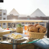 Отель Happy day pyramids view, фото 9