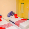 Отель Oyo 90868 Ikhwan Guest House Syariah, фото 3
