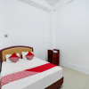 Отель OYO 90387 Sepakat Guest House, фото 5