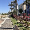 Отель Flat Boqueirao Praia Grande в Прая-Гранди