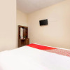 Отель OYO 3076 Lilik Homestay Syariah, фото 15