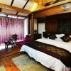 Отель Lijiang Yiran Ethnic custom Viewing Inn, фото 35