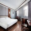 Отель Vienna International Hotel of  Yingbin Road Altay Airport, фото 3