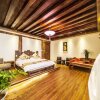 Отель Lijiang Nobles Living Castle Hotel, фото 25