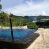 Отель El Nido Viewdeck Cottages, фото 18