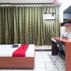 Отель Goodnews Travellers Inn by RedDoorz, фото 22