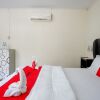 Отель RedDoorz Plus @ Alam Raya Hotel, фото 4