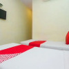 Отель OYO 18842 Amana Suites, фото 12